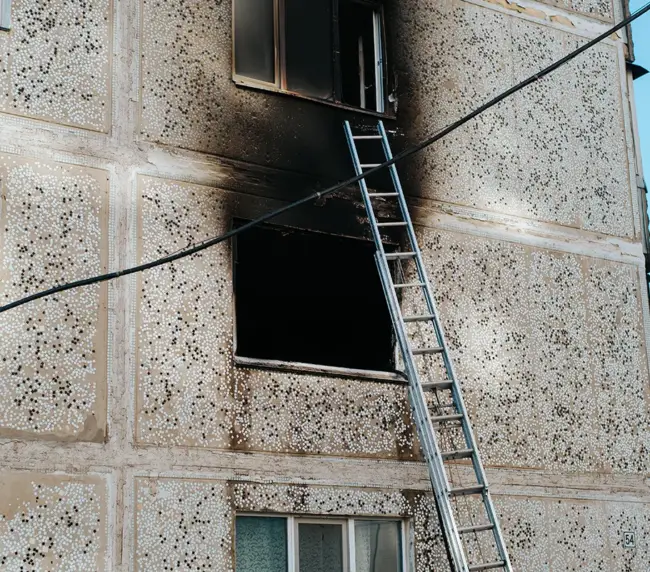 burnt-out-apartments-outside-view-black-window