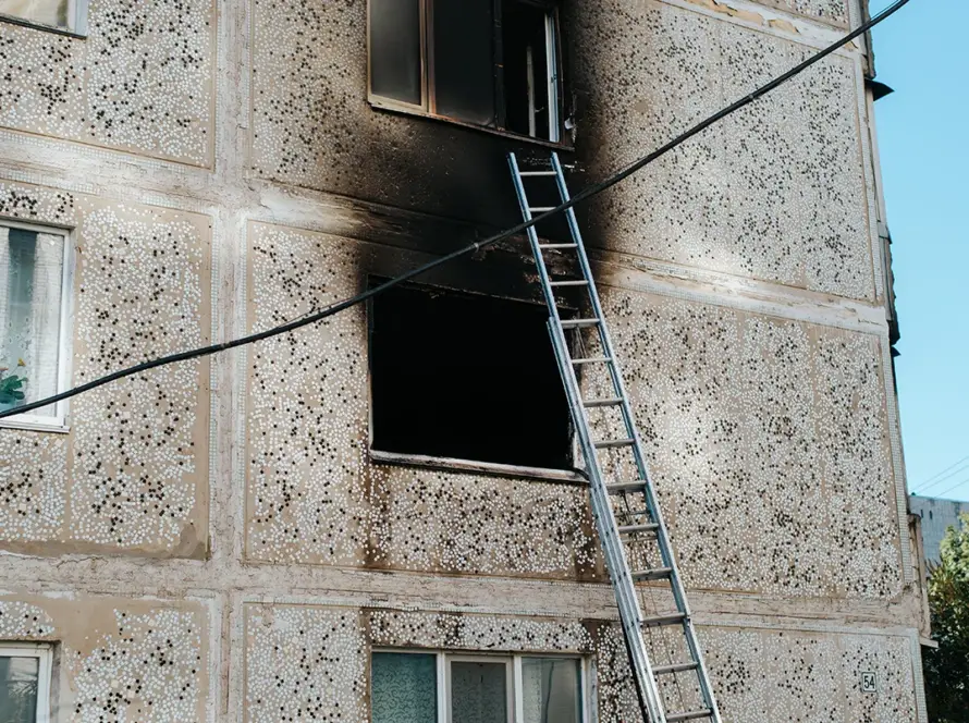 burnt-out-apartments-outside-view-black-window