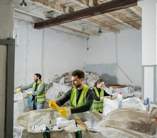 male-worker-in-protective-vest-and-gloves
