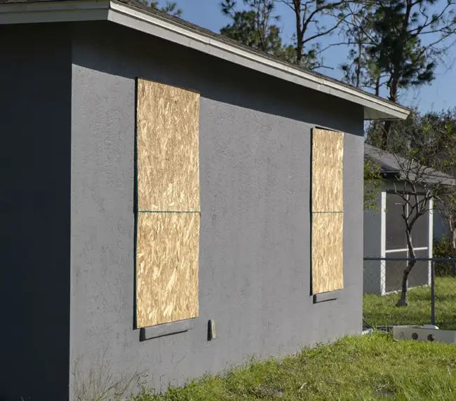 plywood-mounted-as-storm-shutters-for-hurricane