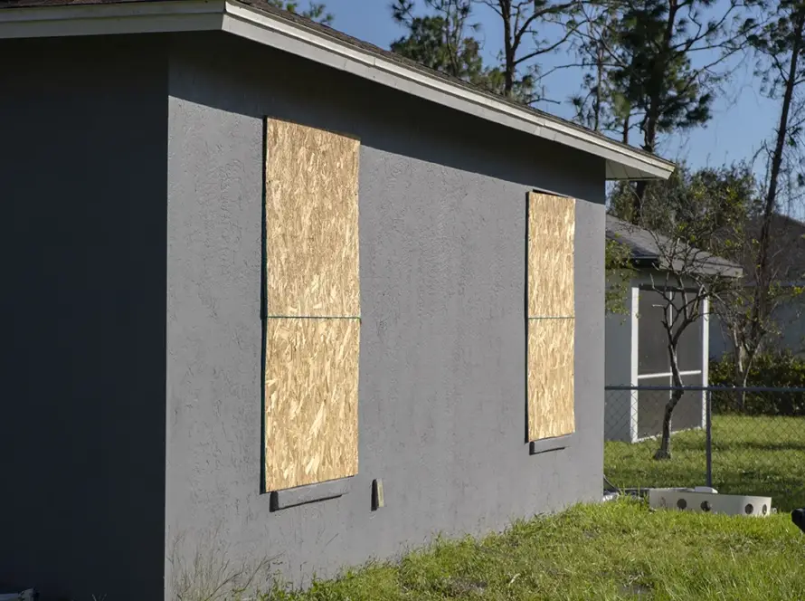 plywood-mounted-as-storm-shutters-for-hurricane